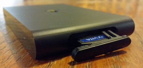 Insert PS Vita games into the side -- and then start hoping they work.